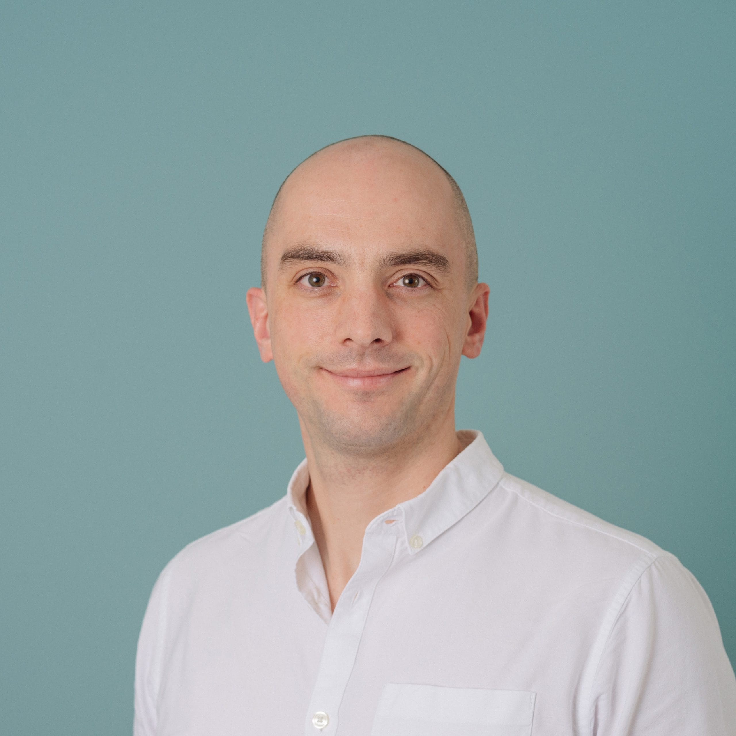 Adam Goode headshot logo