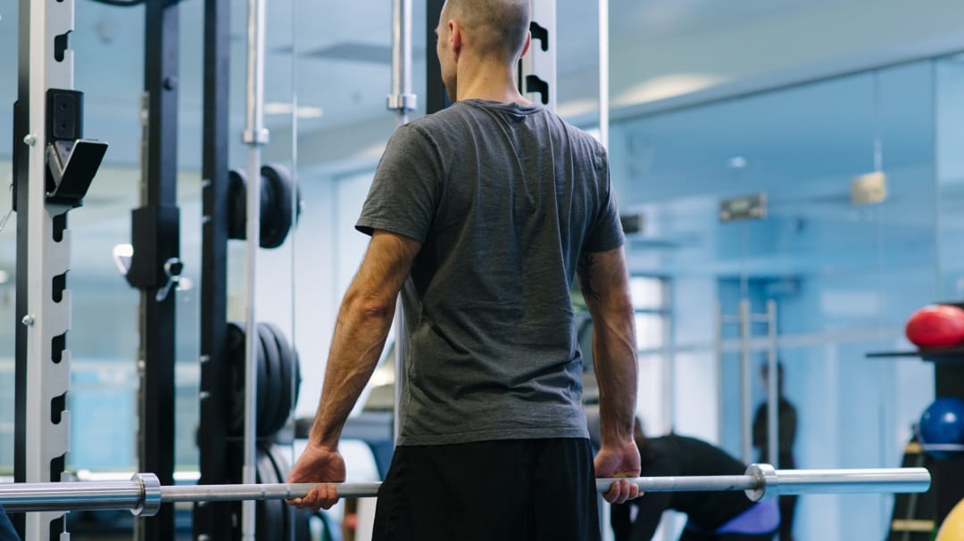 man holding a weight